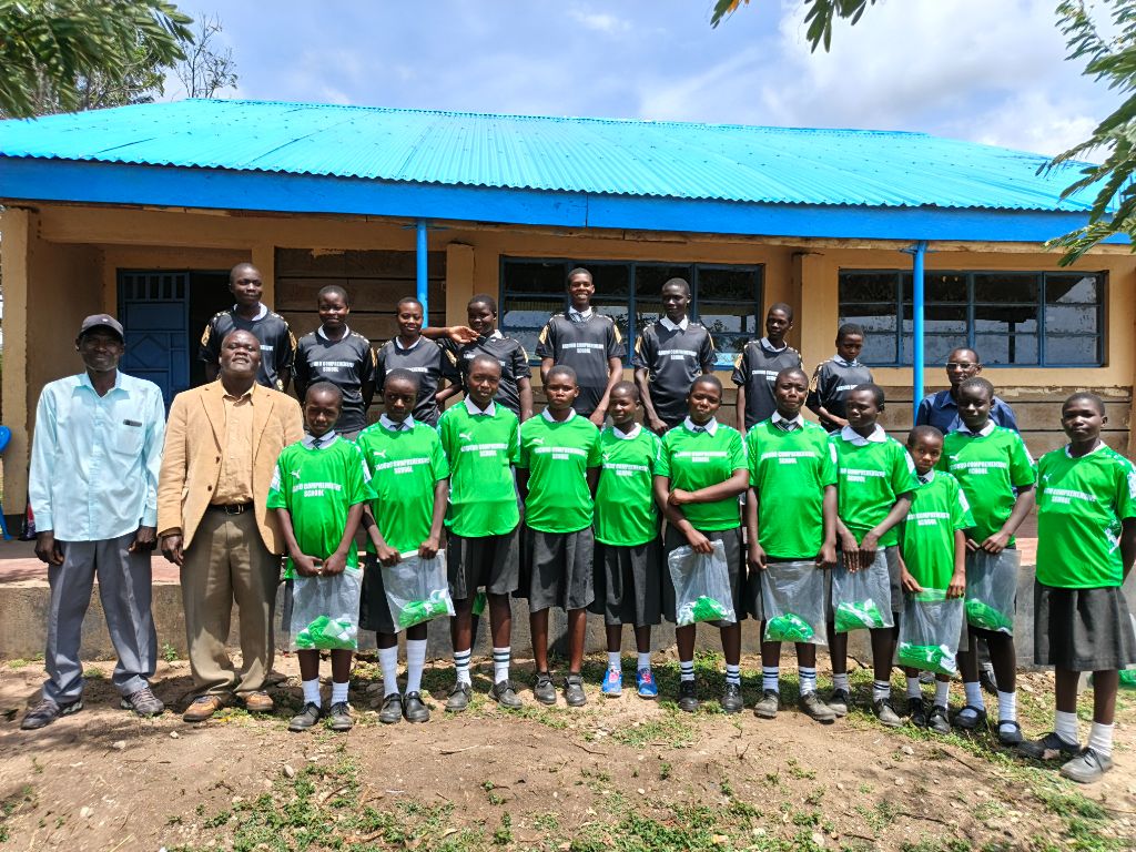 Kaduro Primary School students with resources